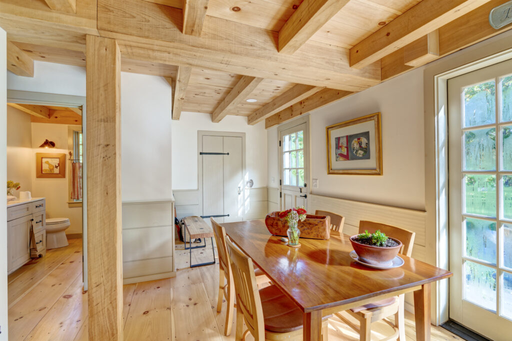 Light and airy dining room in a small Cape home built by Early New England Homes