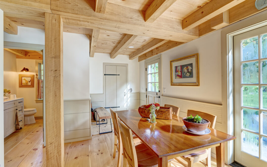 Light and airy dining room in a small Cape home built by Early New England Homes